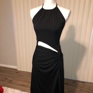 Sexy date night dress! Slit in thigh, peekaboo opening, halter top, black dress